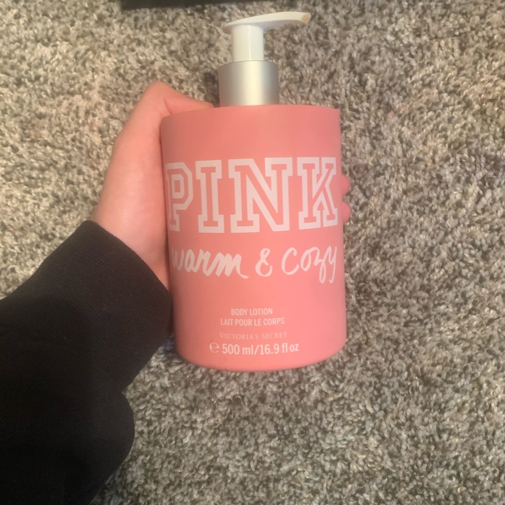 PINK bottle of warm and cozy body lotion